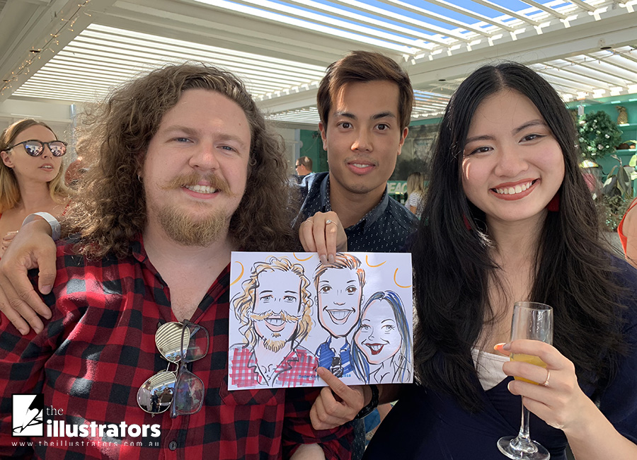Happy company employees holding a caricature drawing in Sydney
