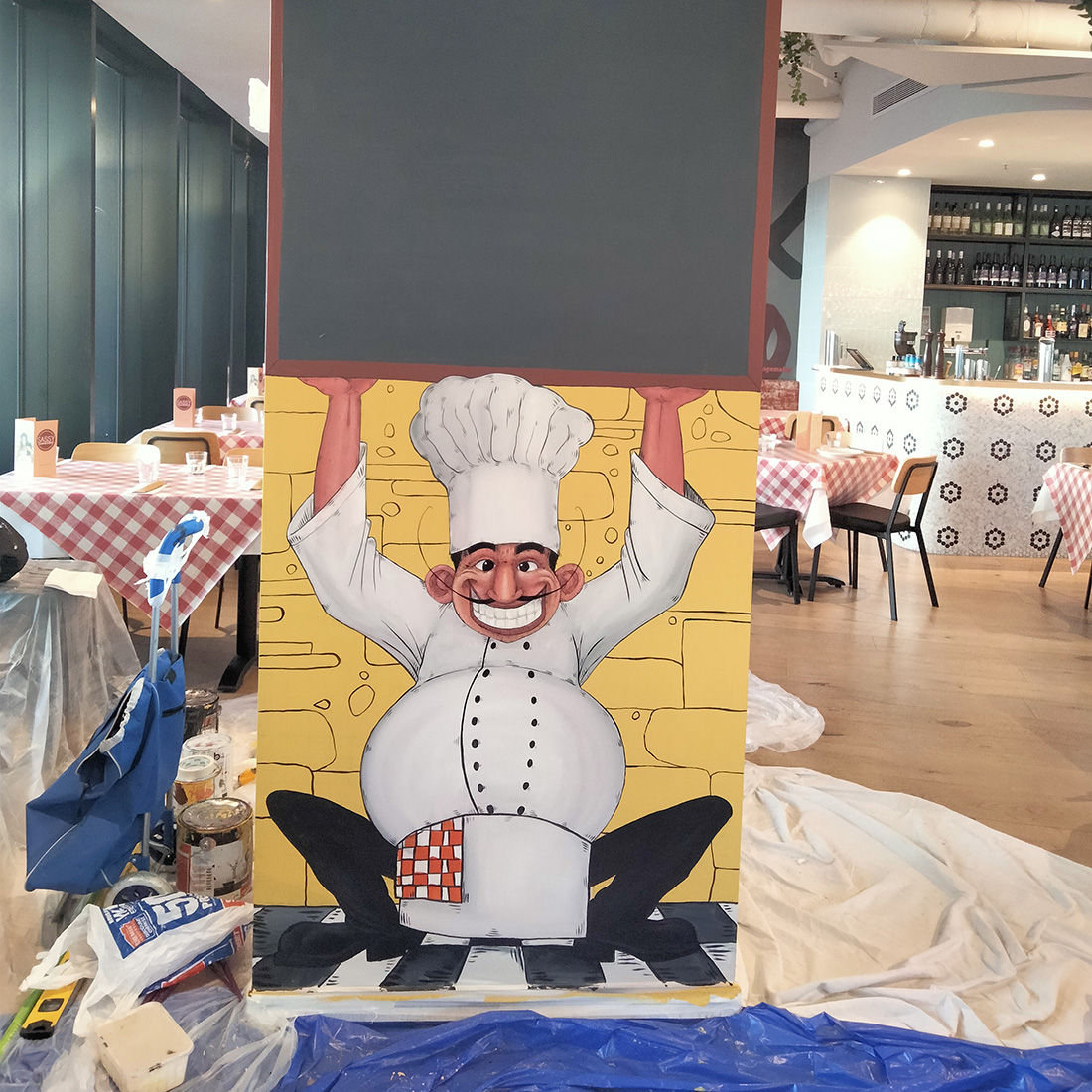 Humorous mural of a chef in Melbourne
